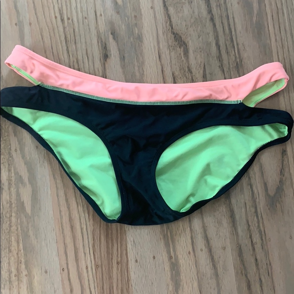 Full coverage with cut out bikini bottoms. Large